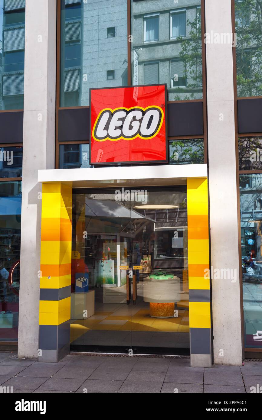 Stuttgart, Germany - April 10, 2023: Lego store toy brand shop with logo portrait format in Stuttgart, Germany. Stock Photo
