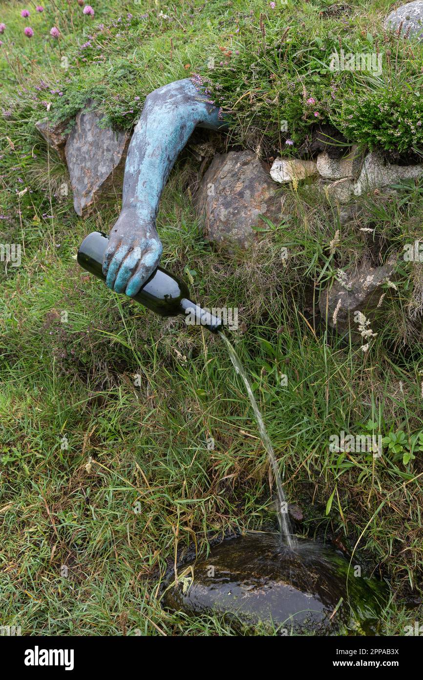Funny Artwork: Spring Well Pouring Water from a Bottle, Mangersta, Uig, Lewis, Isle of Lewis, Outer Hebrides, Western Isles,  Scotland, United Kingdom Stock Photo