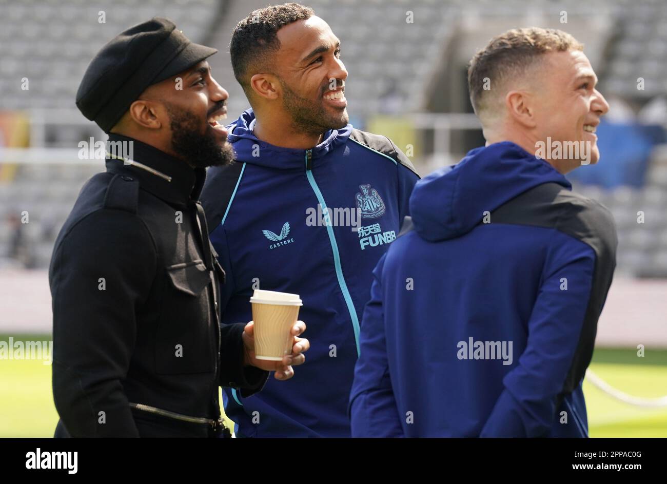 Newcastle United's Joelinton Callum Wilson (centre) and Kieran Trippier (right) greet former Newcastle player Danny Rose before the Premier League match at St. James' Park, Newcastle upon Tyne. Picture date: Sunday April 23, 2023. Stock Photo