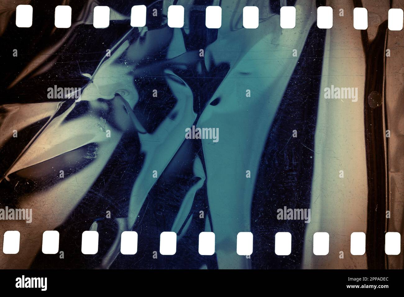 Dusty and grungy 35mm film texture or surface. Perforated scratched ...