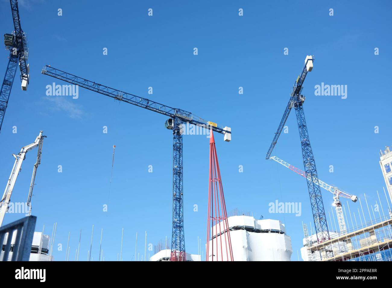 A cluster of cranes pierces the skies at Brent Cross Town, a new developement going up in the Brent Cross area of North London. Taken in May 2023 Stock Photo