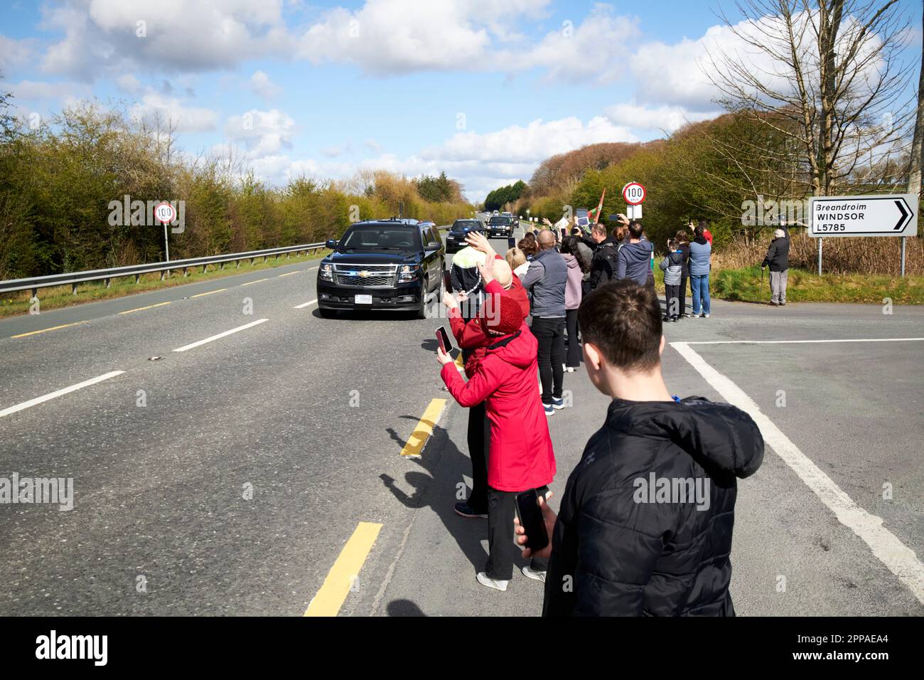 wellwishers line the road for president bidens motorcade on official state visit to Ireland on the N5 outside county mayo republic of ireland Stock Photo