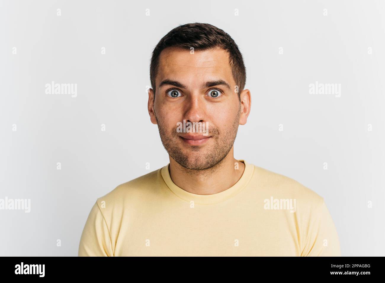 Close up man with eyes wide open Stock Photo Alamy