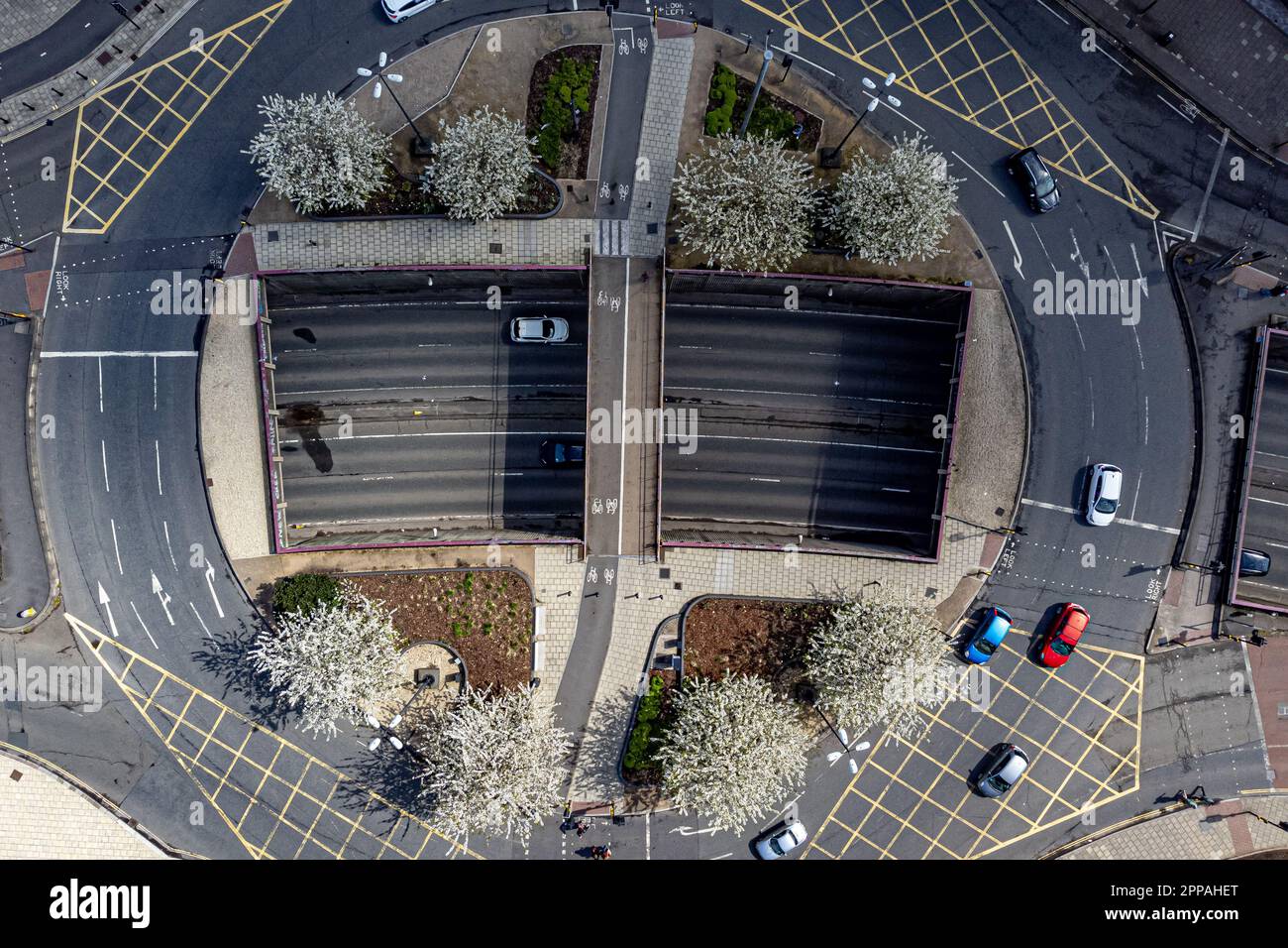 Blossoms are seen on a roundabout from above in Bristol, where sunny ...