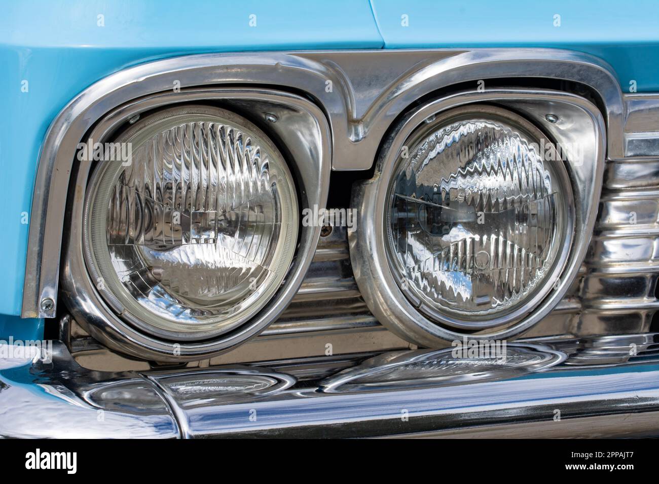 Vintage Headlights of a blue oldtimer Stock Photo Alamy