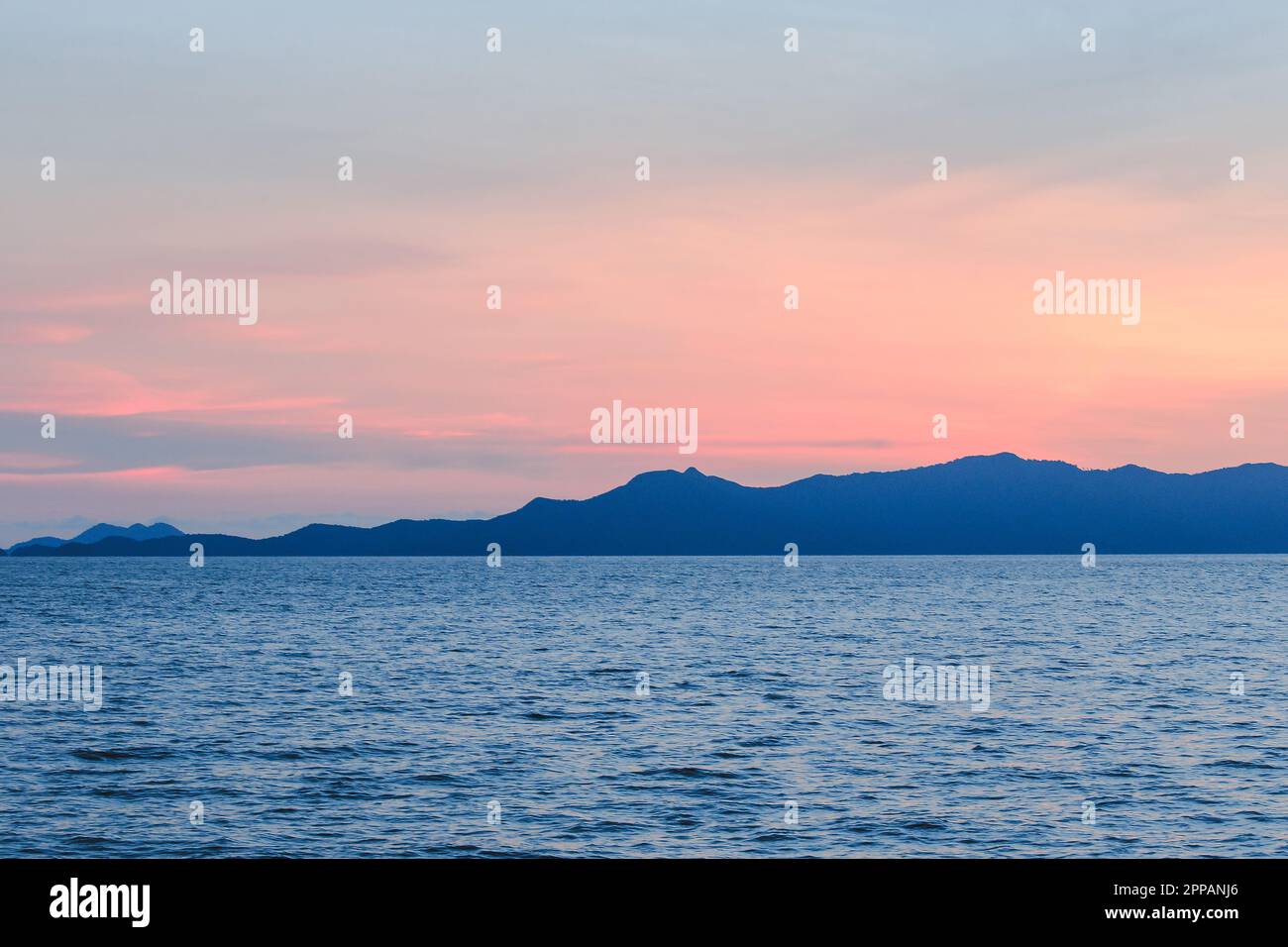 Twilight light of the sunset with beautiful sea landscape Stock Photo ...