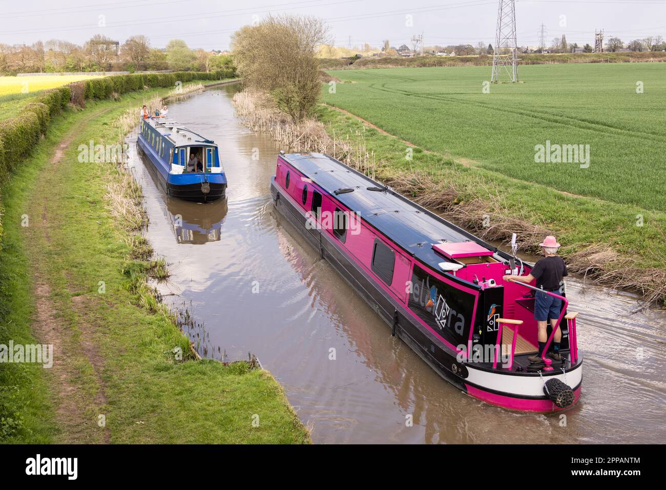 Elektra, a solar powered canal barge as it passed up the Ashby Canal close to Nuneaton in Warwickshire Stock Photo