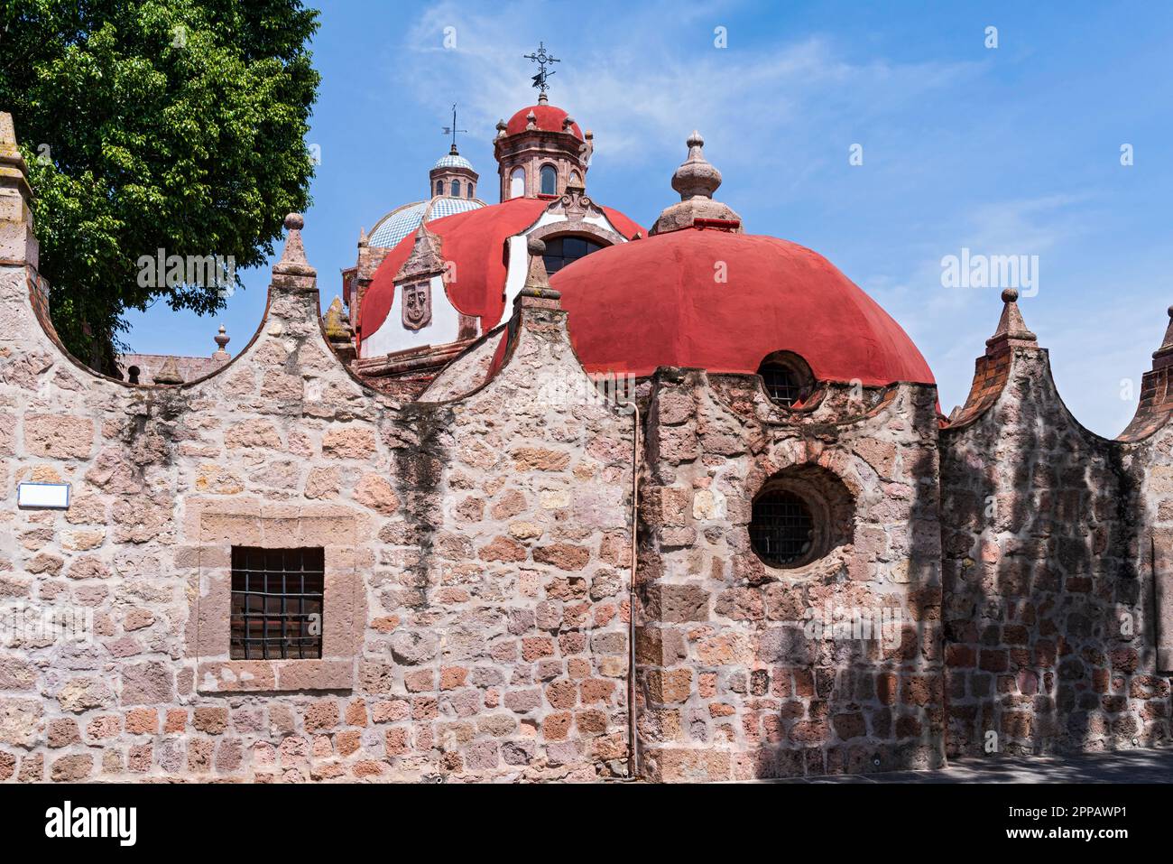 our lady of carmen temple domes of historic baroque architecture covering church and chapel in morelia michoacan mexico Stock Photo