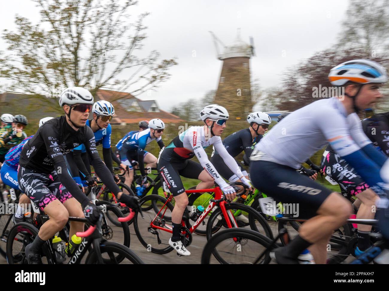 Rutland, UK. 23rd Apr, 2023. Rutland April 23 20 23  riders pass the 200-year-old windmill Main pack passing Wyndham old windmill. Mens round of the International CiCLE Classic 105 km (70 miles) cycle road race featuring on and off road elements along a challenging route taking in the most of the beautiful  countryside around sections of the Rutland-Melton Clifford Norton  Alamy  Live News Credit: Clifford Norton/Alamy Live News Stock Photo