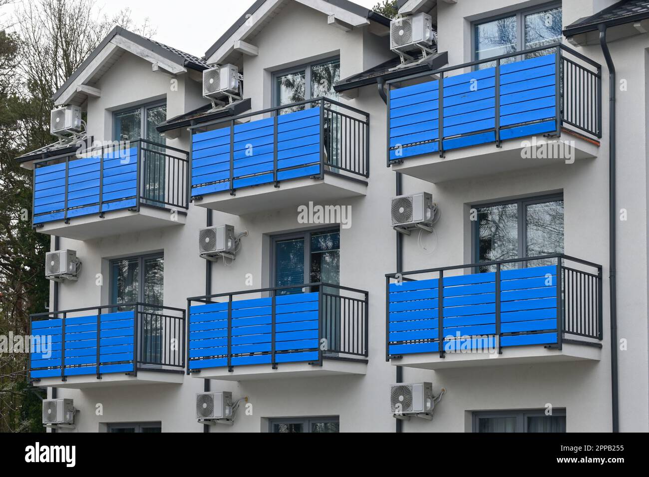 Air conditioner compressor outdoor units installed outside the building ...