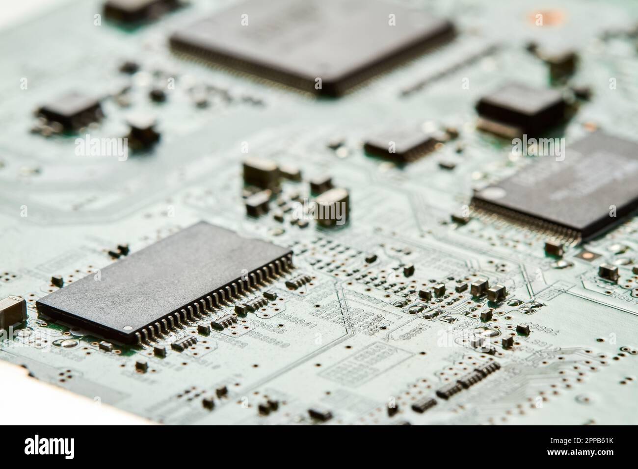Close-up of computer chip on a part of electronic printed circuit board ...