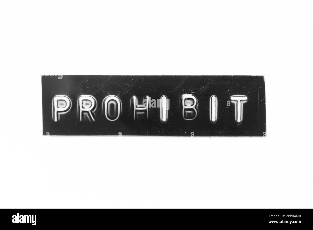 Black color banner that have embossed letter with word prohibit on ...