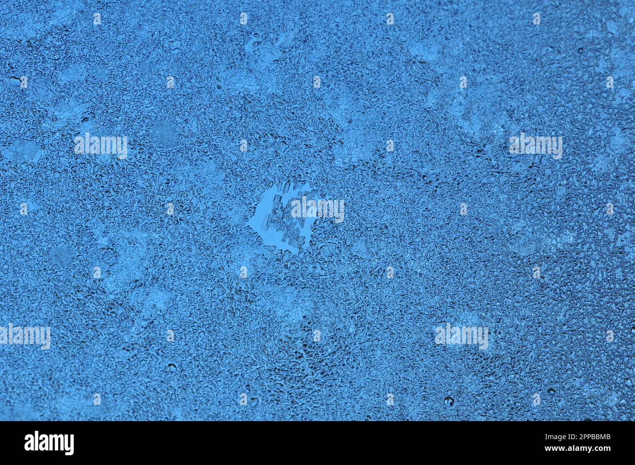 Ice and water on window background Stock Photo