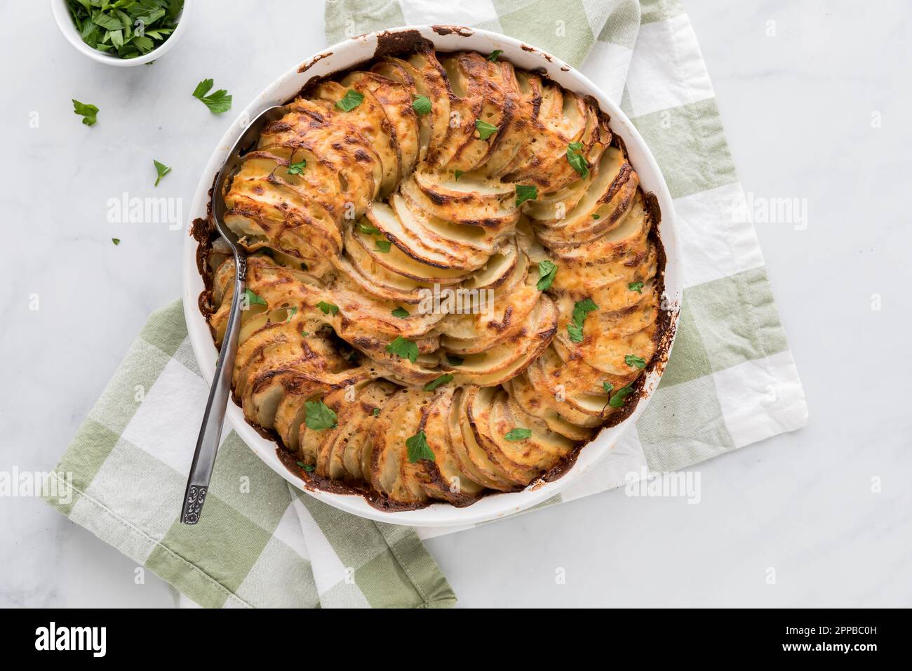 Creamy Au Gratin scalloped potatoes, fresh out of the oven, ready for