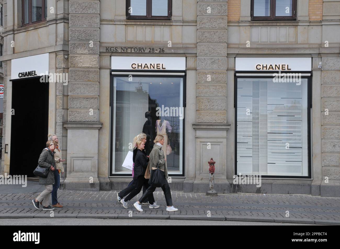 Copenhagen /Denmark/23 April 2023/People ride b ike and pass by the Chanel  store in danish capital Copenhagen Denmark. (Photo.Francis Joseph Dean/Dean  Pictures Stock Photo - Alamy