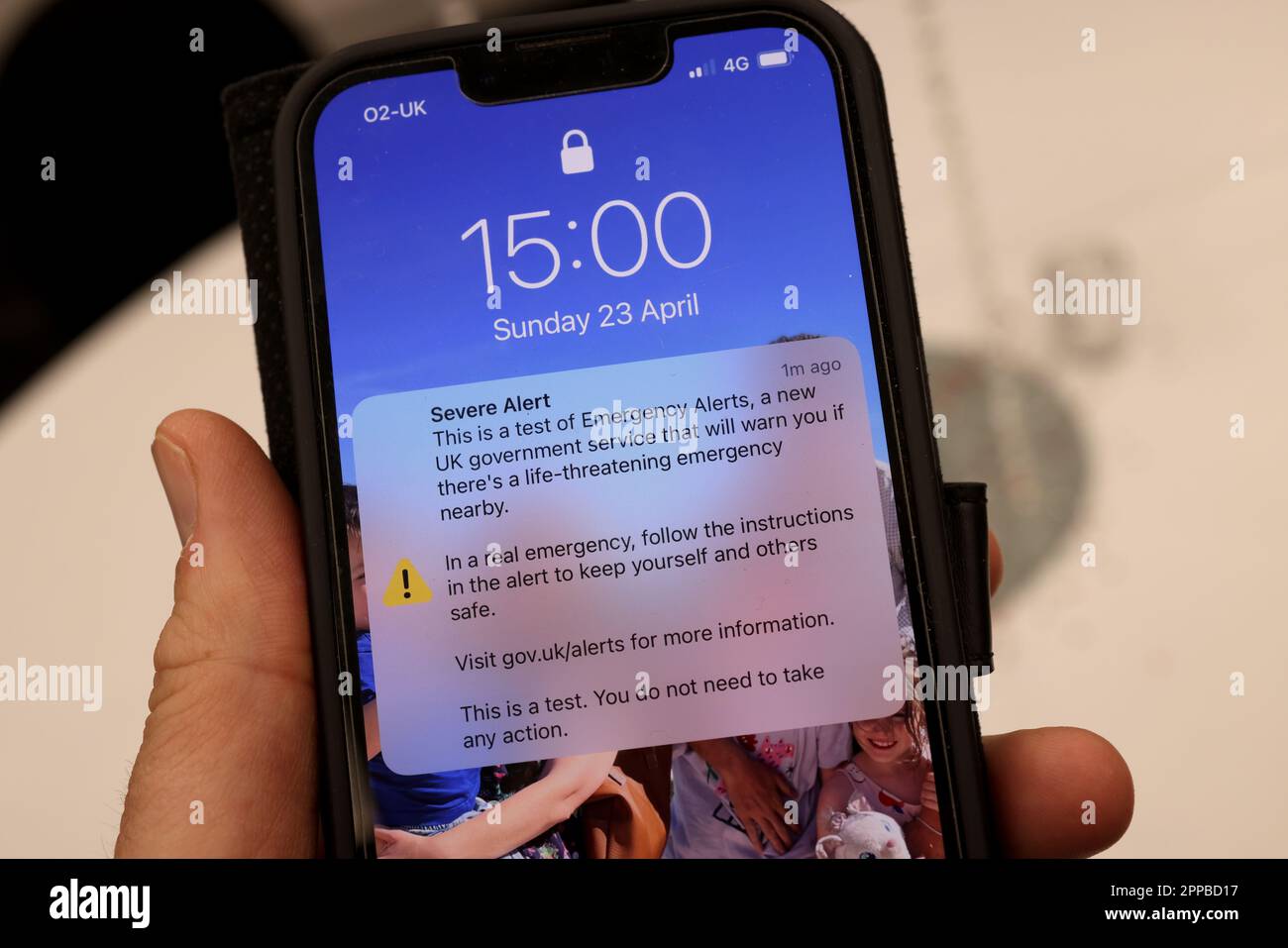 The UK Government Emergency Alert Text message pictured on an iPhone at 14:59 on Sunday 23rd April 2023, London, UK. Stock Photo
