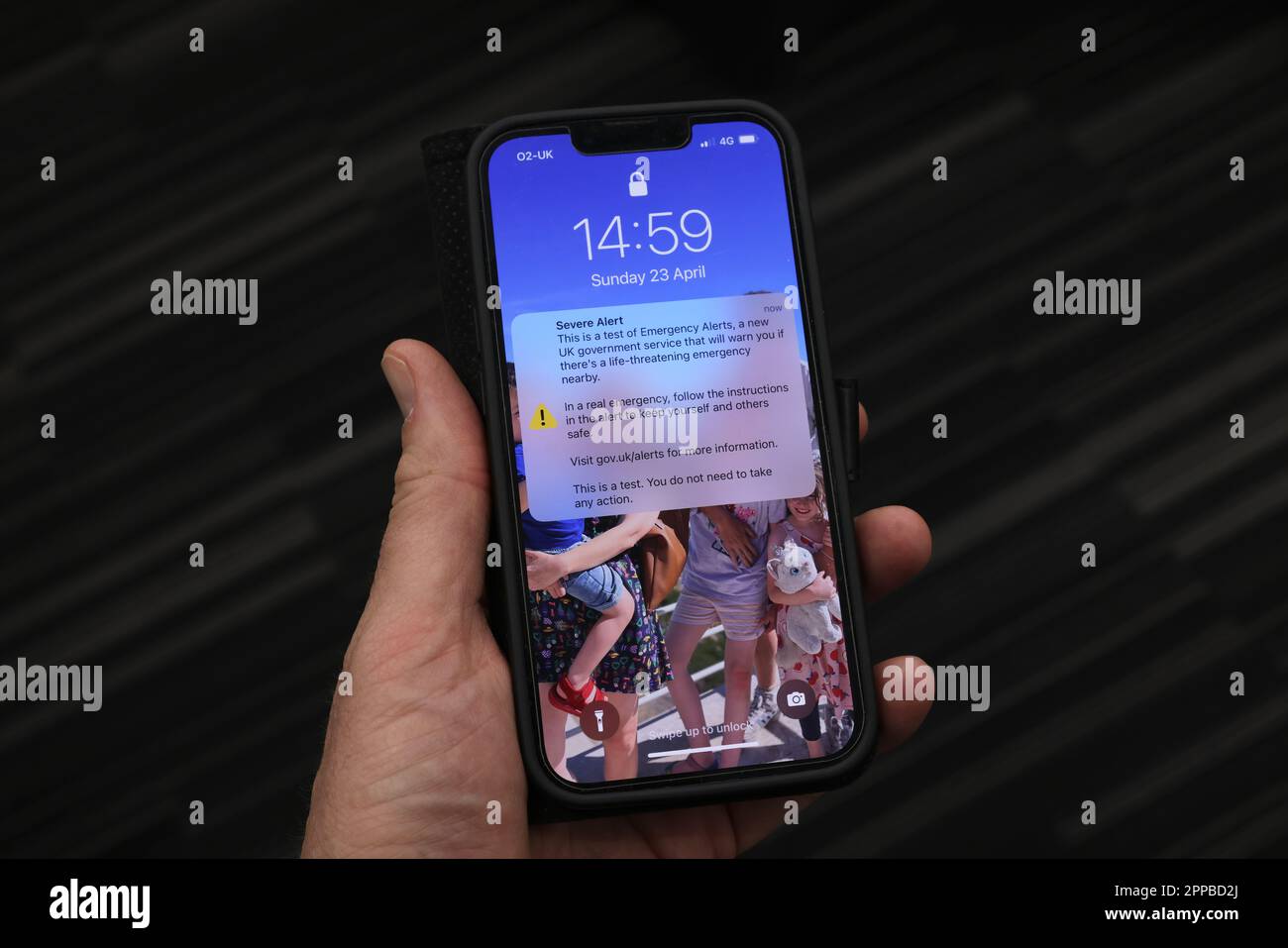 The UK Government Emergency Alert Text message pictured on an iPhone at