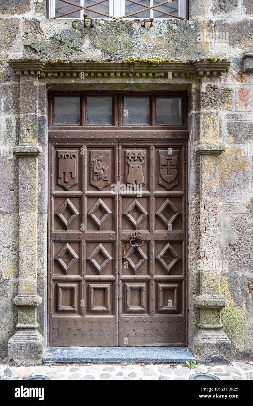 Old rustic wooden door, in the town of Salers in Auvergne, France Stock ...