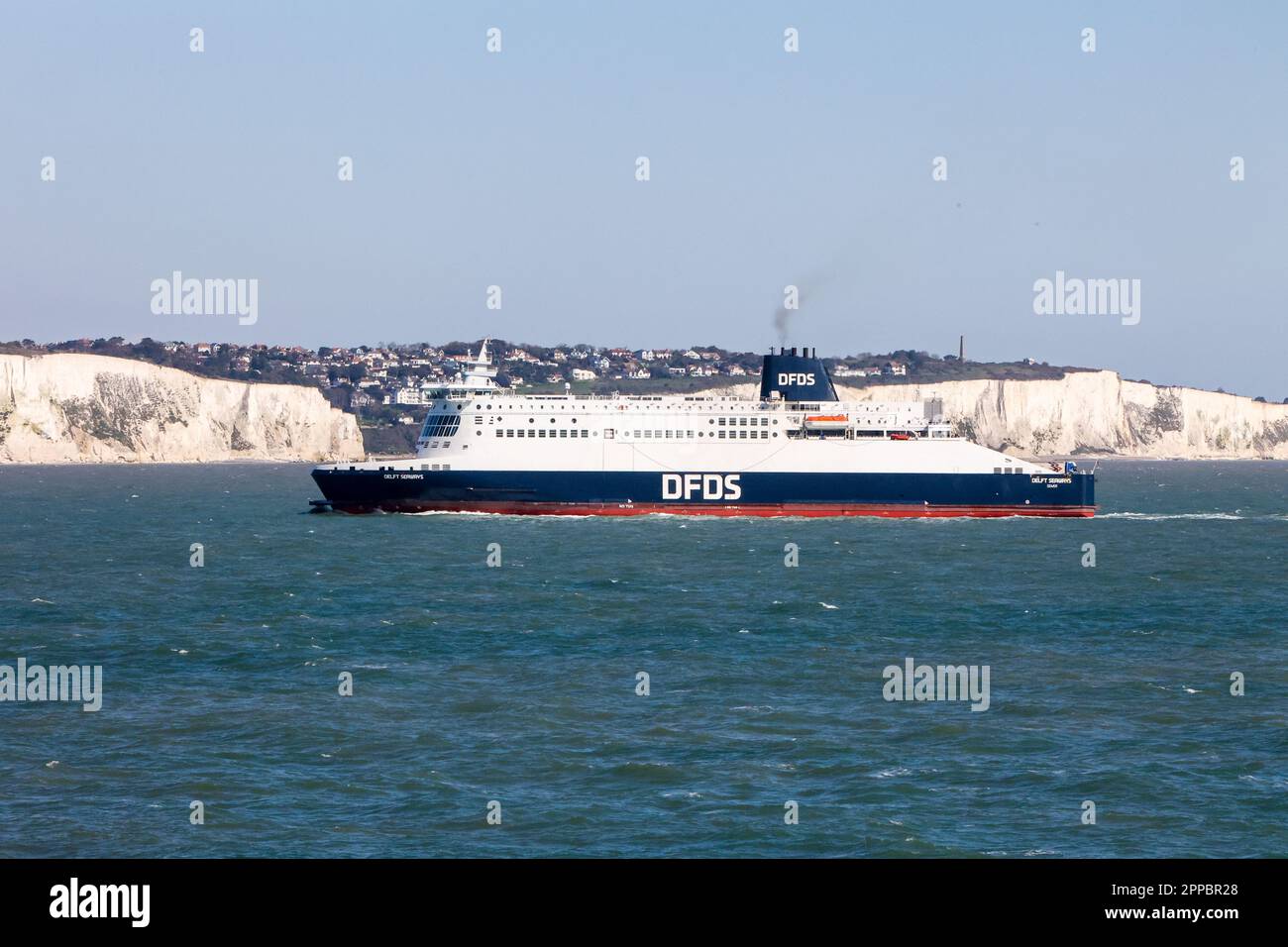 White Cliffs of Dover,and,another,DFDS Ferry,heading,to,Dover from Calais,On board,DFDS Ferry,heading,from,Dover,Port of Dover,England,English,British,GB,Great Britain,UK,United Kingdom,to,Calais,France,French,Europe,European, Stock Photo