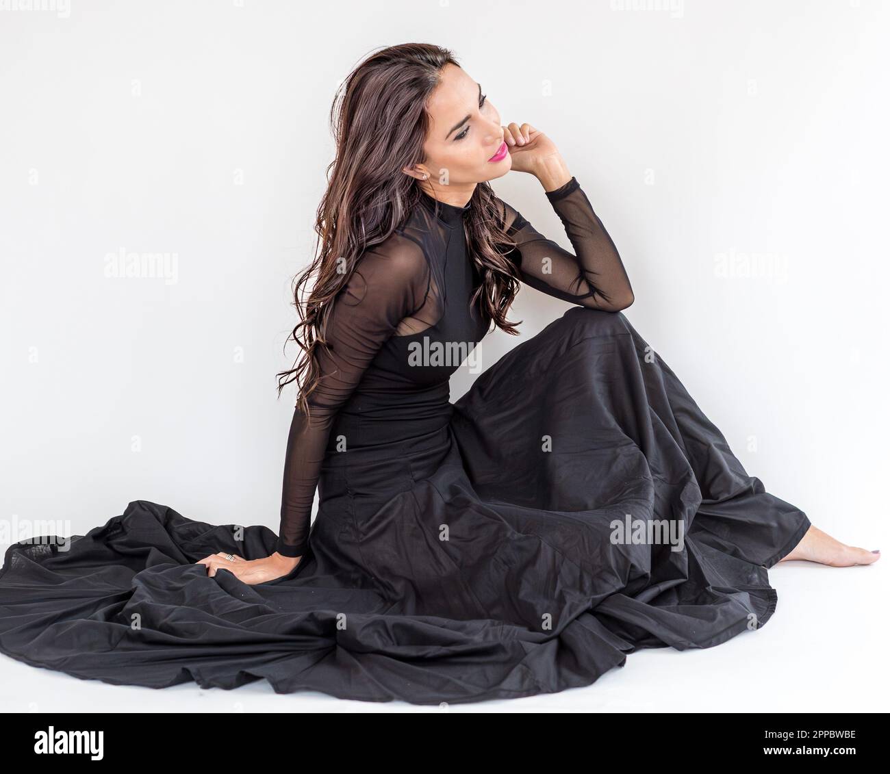 Black dress brunette hi-res stock photography and images - Alamy