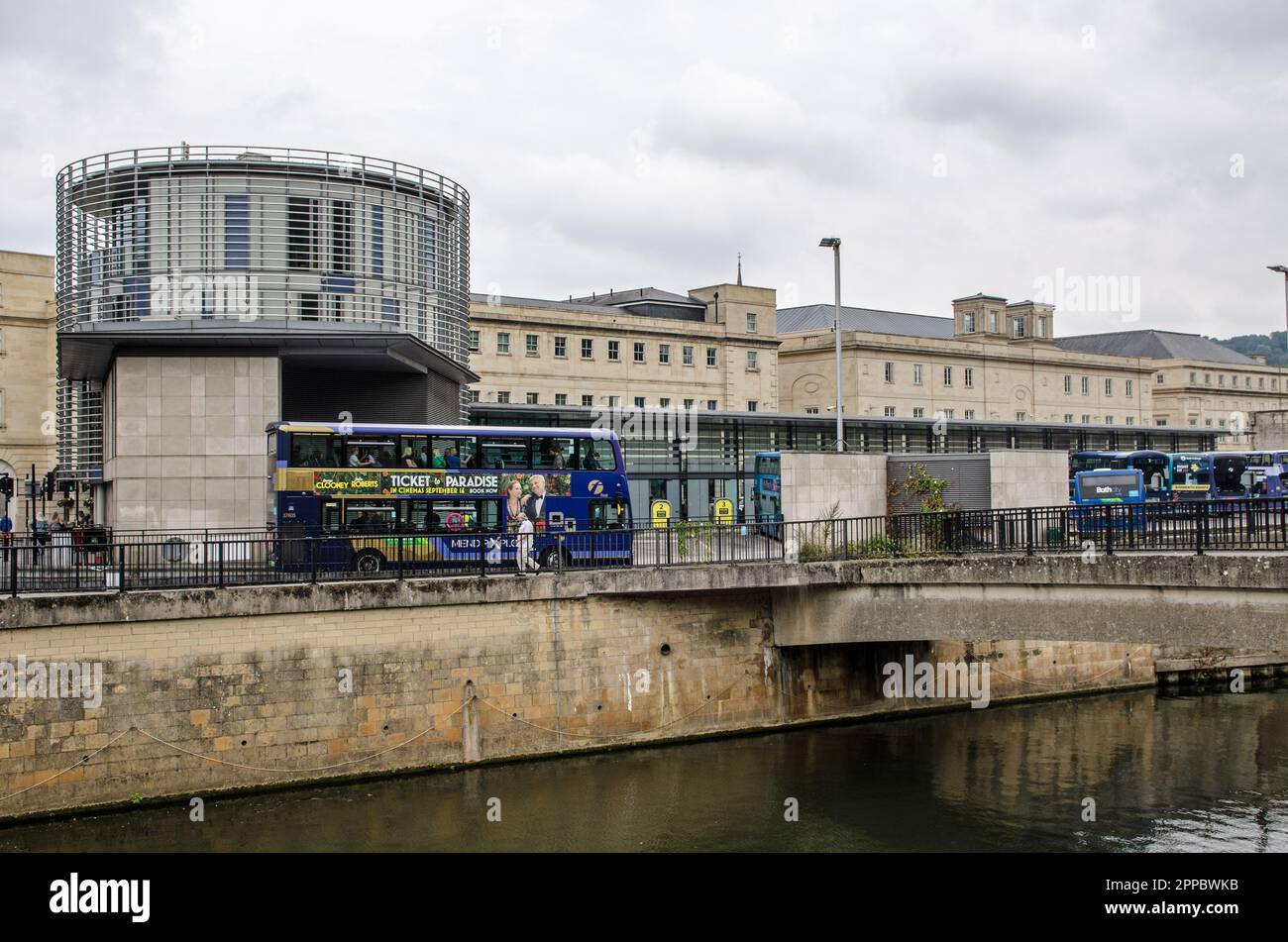 Bath, UK - September 3, 2022: View of the main bus station in Bath, Somerset, as seen from across the River Avon on a cloudy Autumn day. Stock Photo