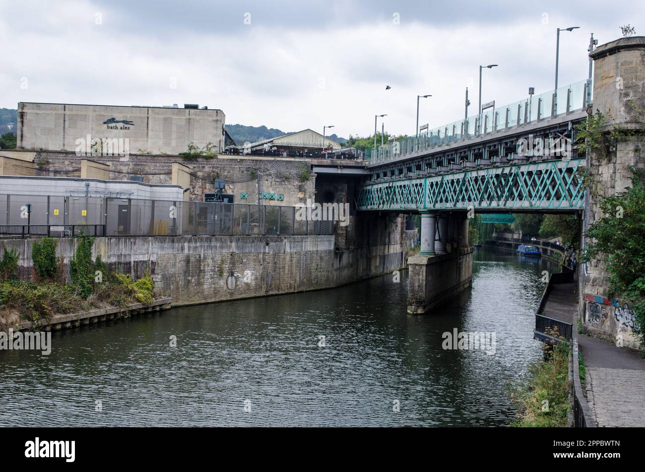 Bath, UK - September 3, 2022: View across the River Avon towards Bath Spa Railway Station on a cloudy afternoon in the autumn. Stock Photo