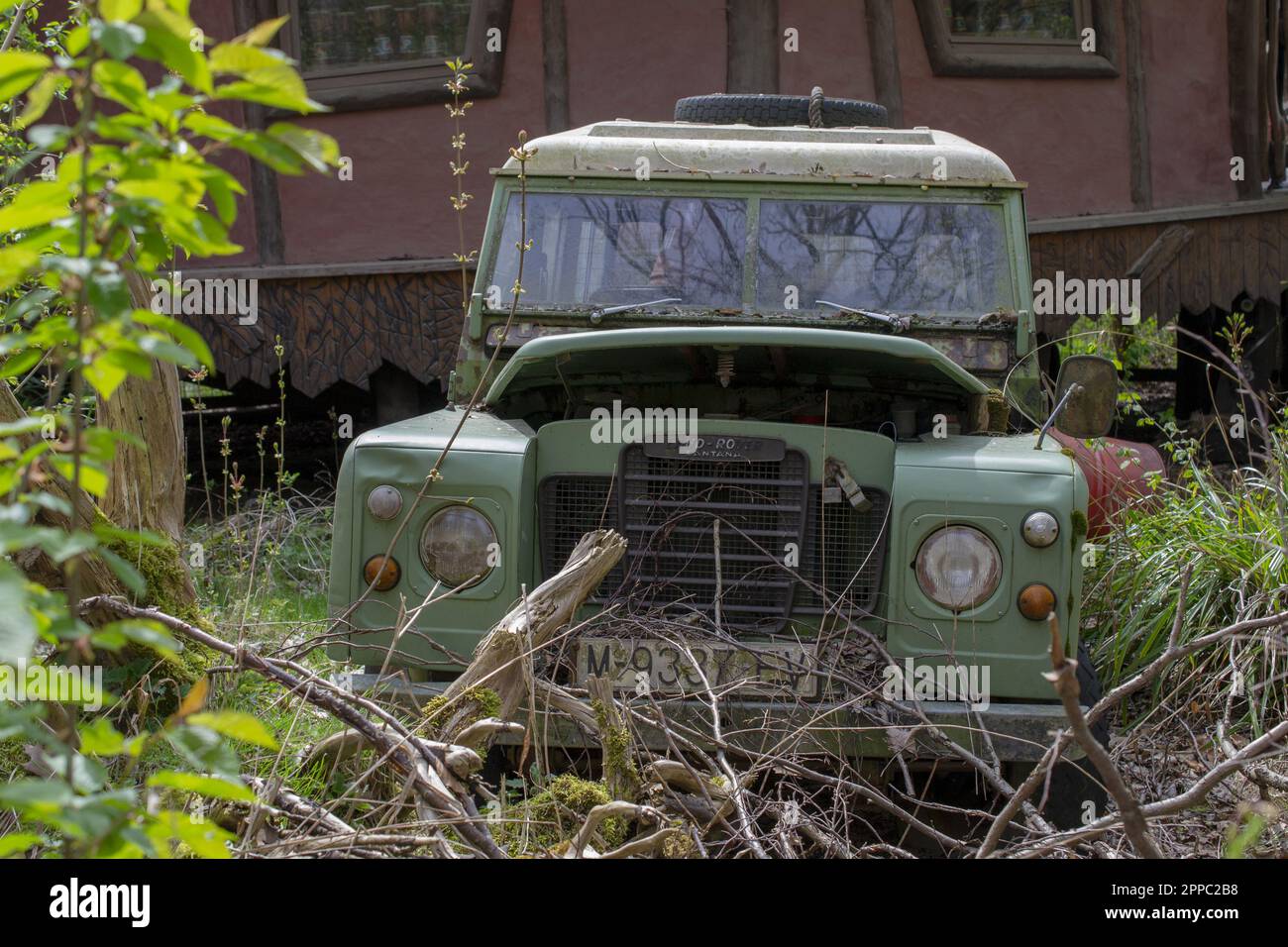 Safari. Jeep stuck in the jungle. Abandoned jeep. Stock Photo