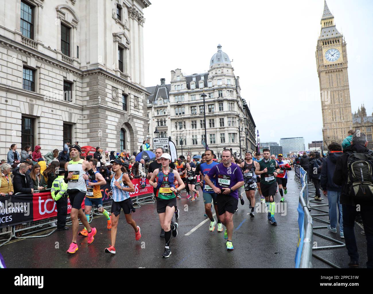 London, UK. 23rd Apr, 2023. Participants in the 2023 London Marathon run through Parliament Sq in London on Sunday, April 23, 2023. Approximately 50,000 runners were taking part raising in excess of £60 million for charity. Photo by Hugo Philpott/UPI Credit: UPI/Alamy Live News Stock Photo