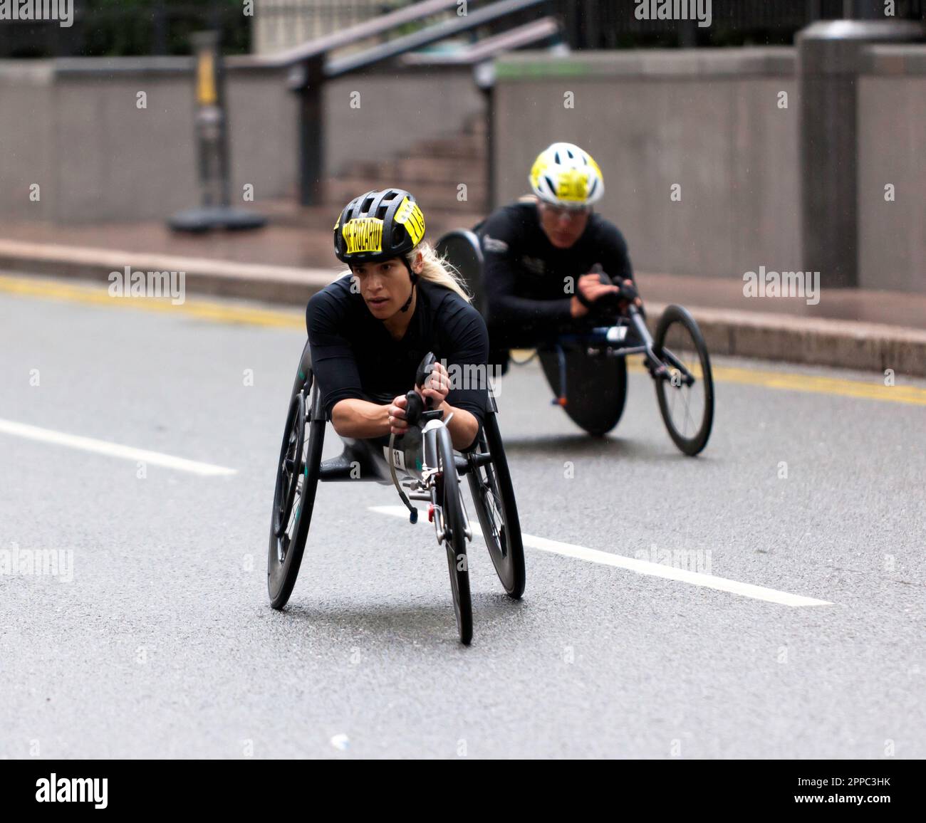 London, UK, 23rd Apr, 2023.  Madison de Rozario, passing through Cabot Square, on her way to winning the womens elite wheelchair race (T54/T54), in a time of 01:38:51. Credit: John Gaffen/Alamy Live News. Stock Photo