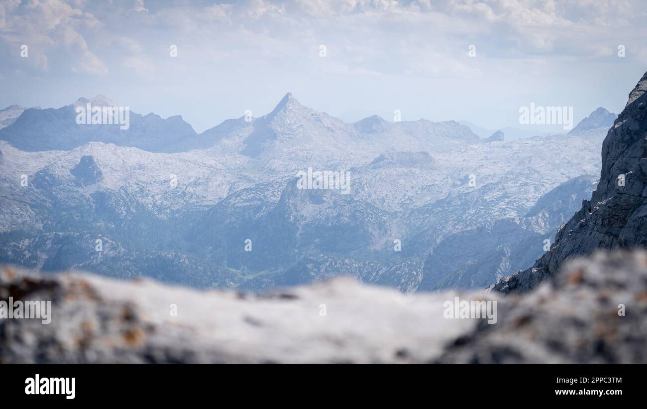Alpine landscape with mountain ranges viewed from high mountain summit, Watzmann, Germany Stock Photo
