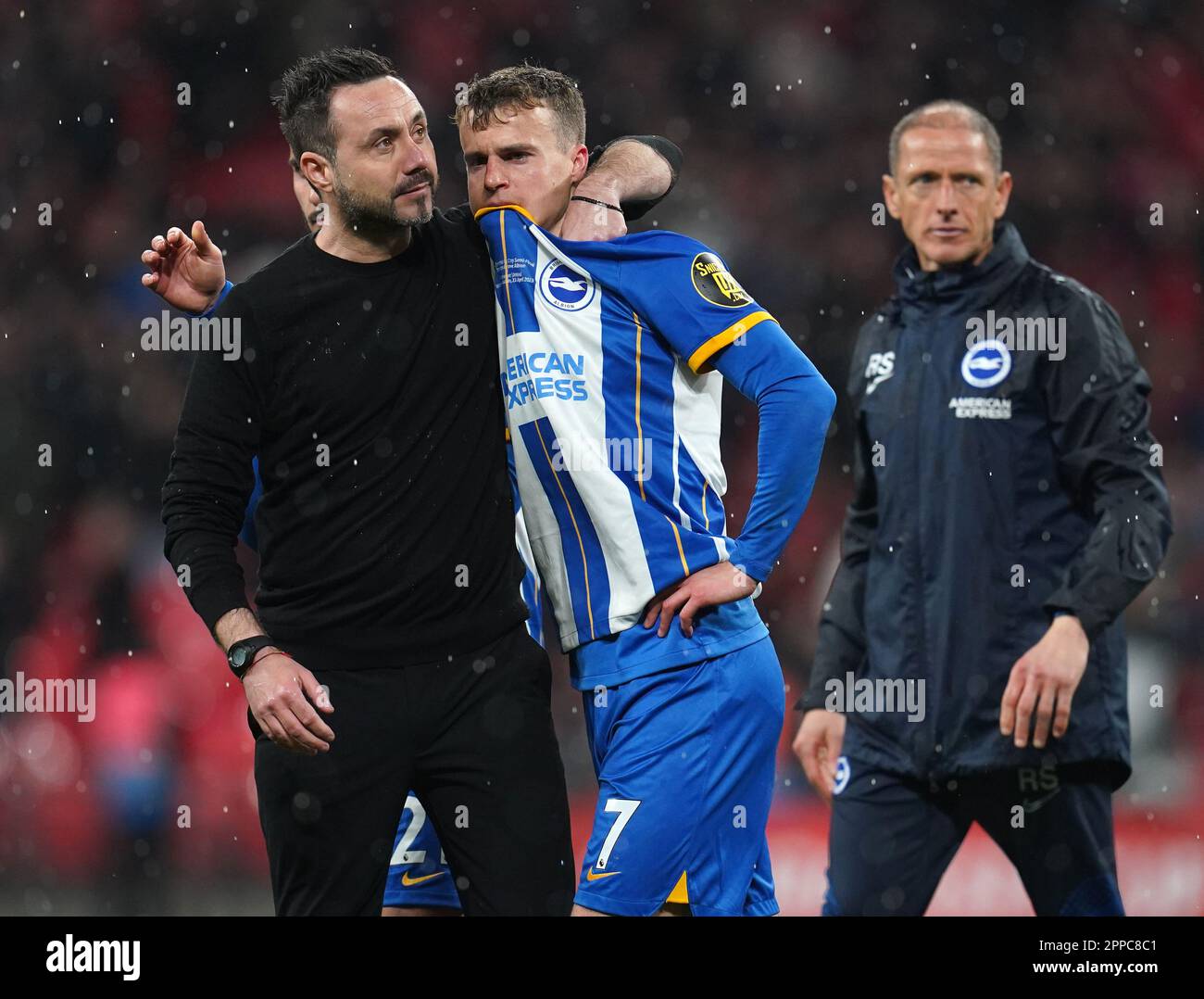 Brighton and Hove Albion manager Roberto De Zerbi comforts Solly March after missing a penalty in the shootout following the Emirates FA Cup semi-final match at Wembley Stadium, London. Picture date: Sunday April 23, 2023. Stock Photo