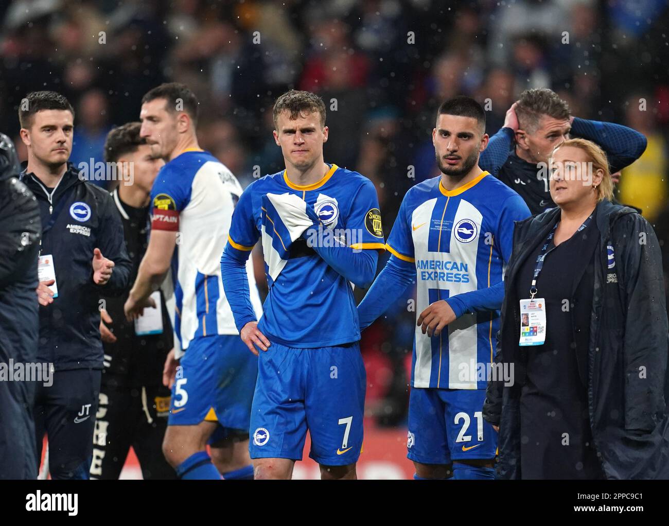 Brighton and Hove Albion's Solly March (centre) after missing a penalty in the shoot-out following during the Emirates FA Cup semi-final match at Wembley Stadium, London. Picture date: Sunday April 23, 2023. Stock Photo