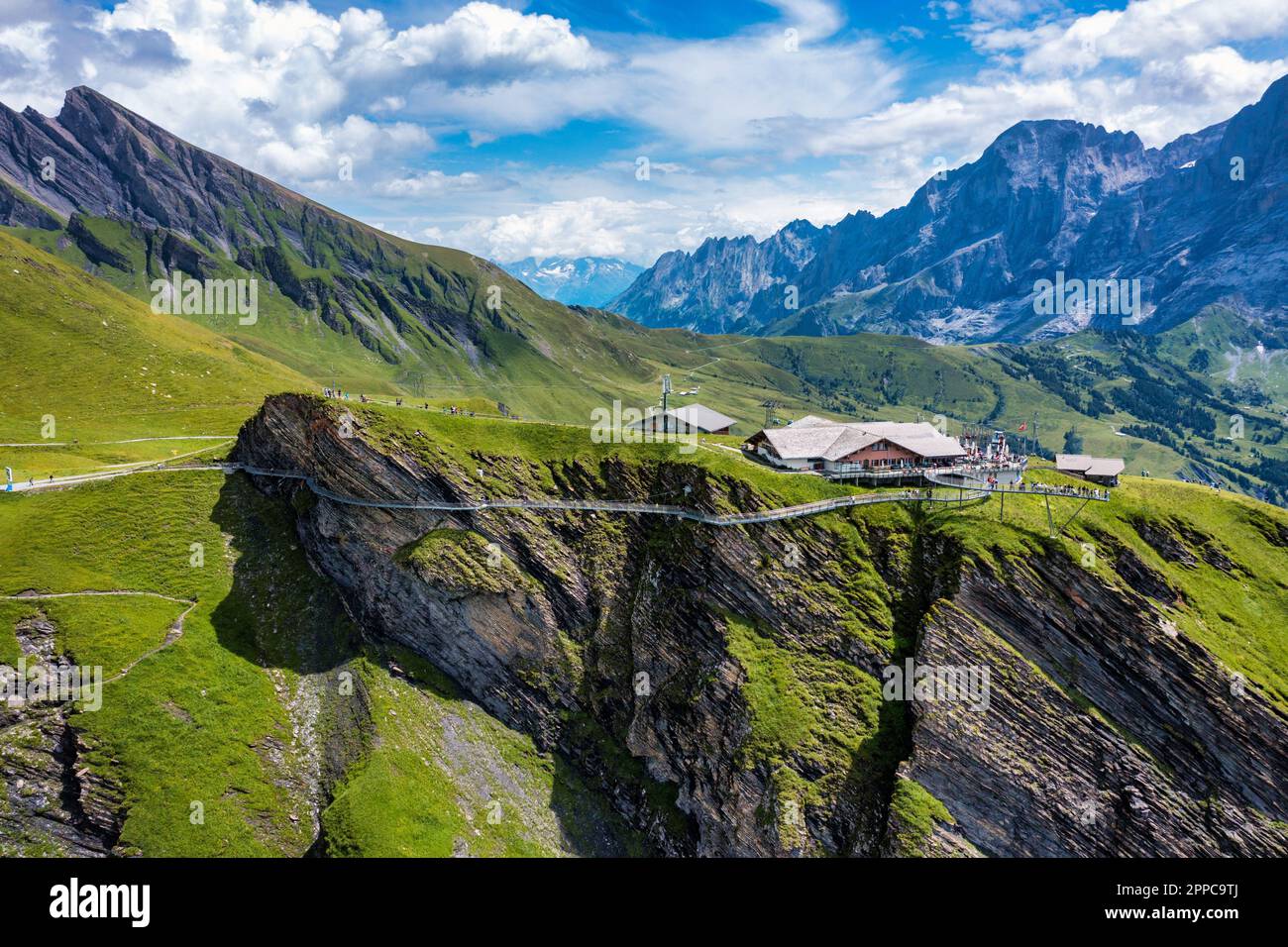 View of Grindelwald First. Popular tourist attraction cliff walk at the
