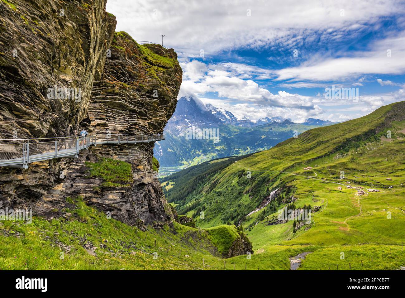 View of Grindelwald First. Popular tourist attraction cliff walk at the