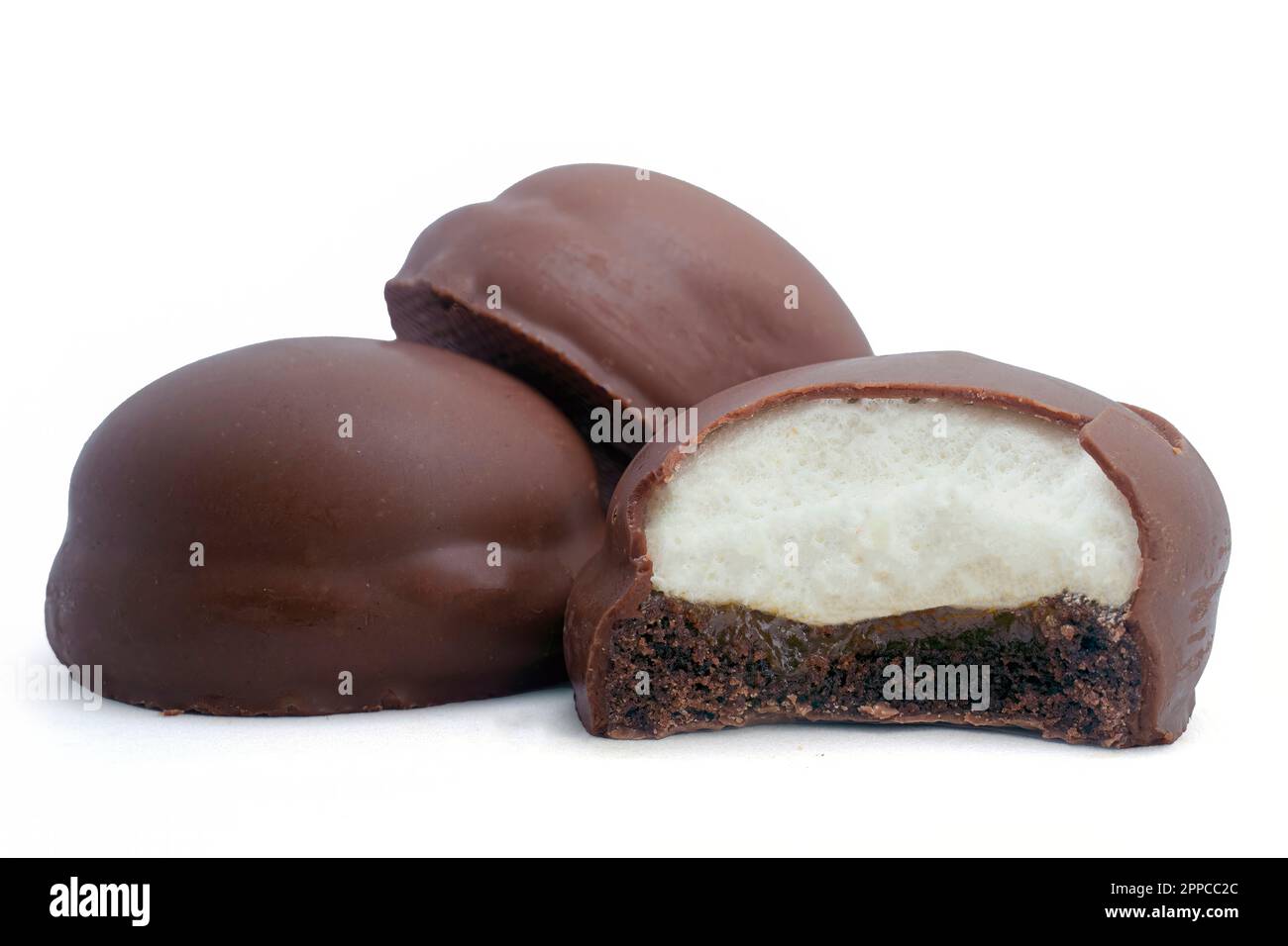 Chocolate cake covered with marshmallows isolated on white background high quality details Stock Photo