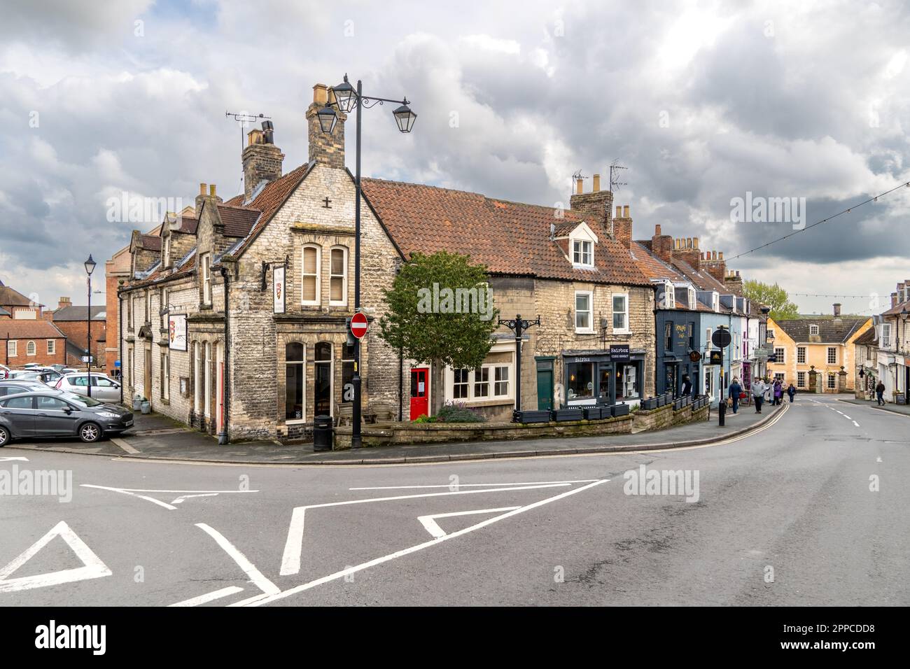 MALTON, NORTH YORKSHIRE, UK - APRIL 22, 2023.  Street view of small and independent shops and stores in the North Yorkshire market town of Malton, UK Stock Photo