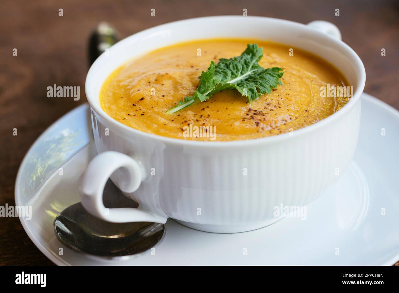 Home made vegan turnip and carrot soup. Stock Photo