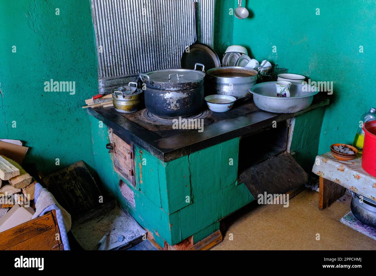 Interior of the kitchen of an old country house. Old cooking stove with