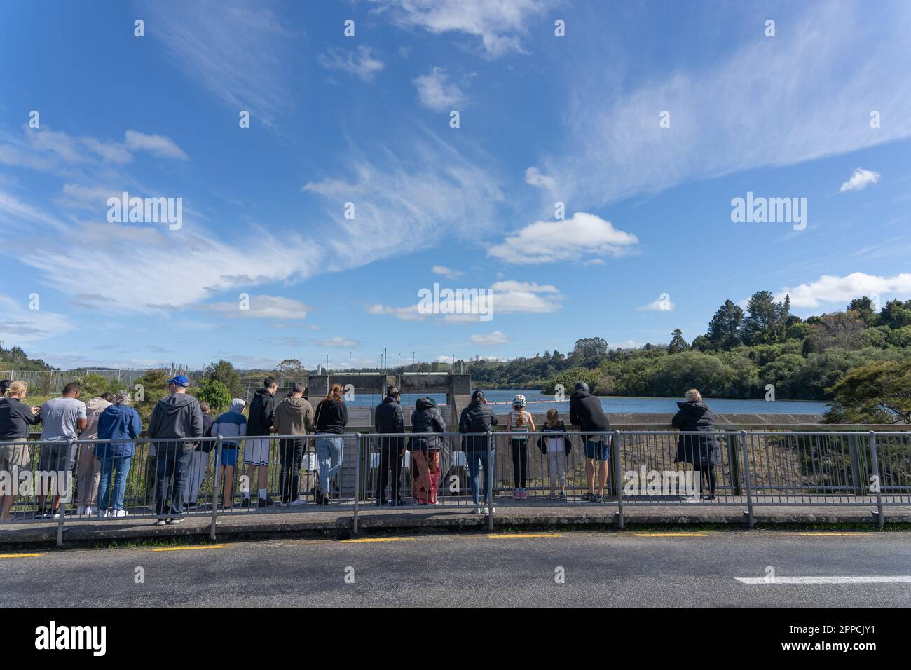 Taupo New Zealand April 15 2023; tourists gather on Aratiatia bridge
