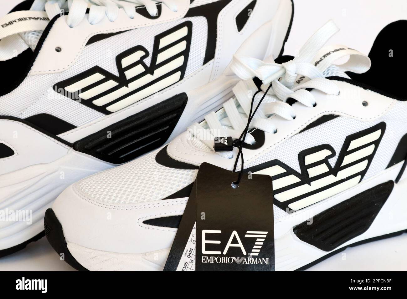 EA7 EMPORIO ARMANI Sneakers. EA7 is an Italian luxury fashion house brand  of GIORGIO ARMANI S.p.A. - Italy Stock Photo - Alamy
