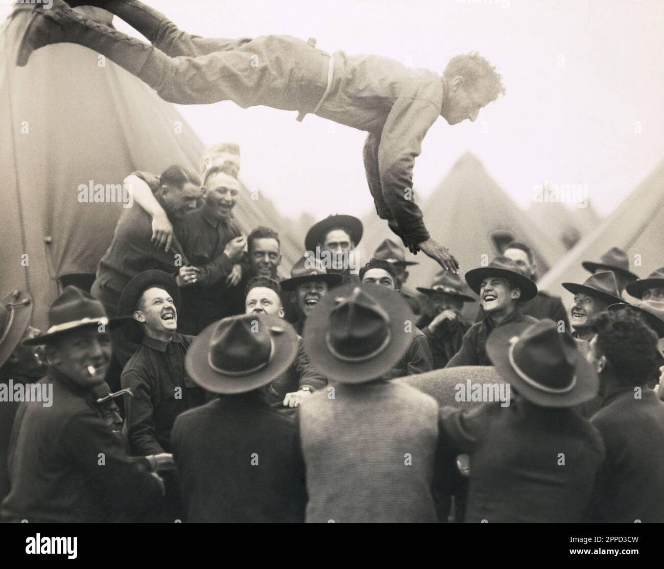 Lewis Hine soldier thrown in the air Stock Photo