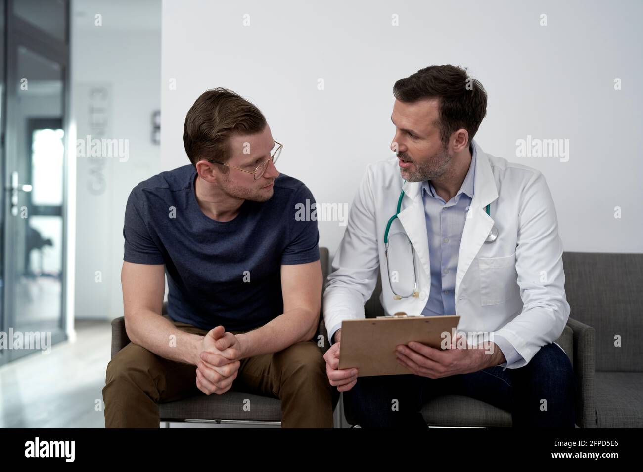 Mature man and doctor hi-res stock photography and images - Alamy
