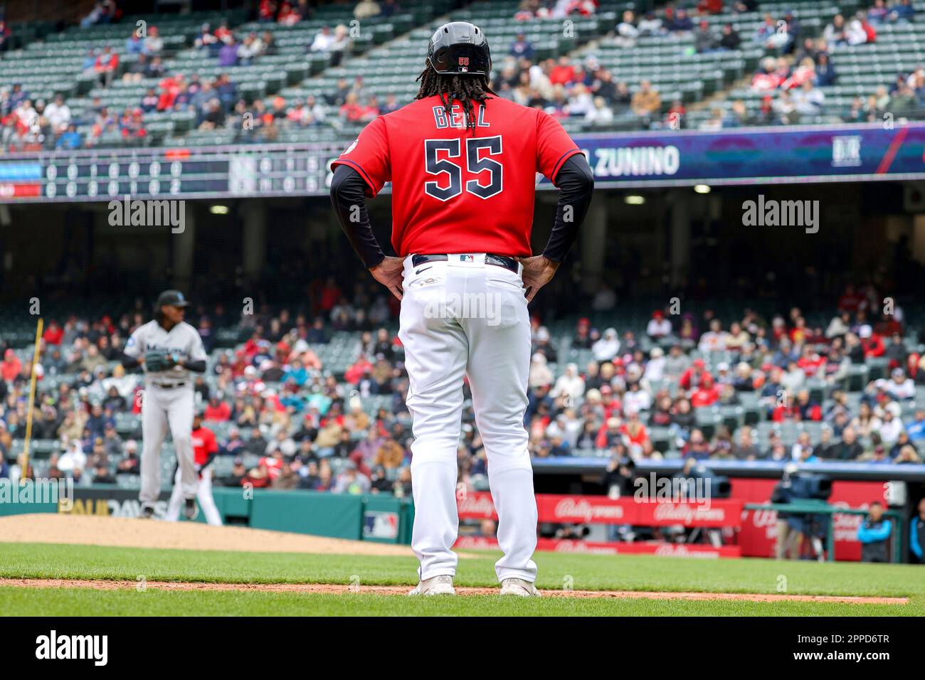 CLEVELAND, OH - APRIL 23: Cleveland Guardians designated hitter Josh Bell  (55) takes first base as he walks during the second inning of the the Major  League Baseball Interleague game between the