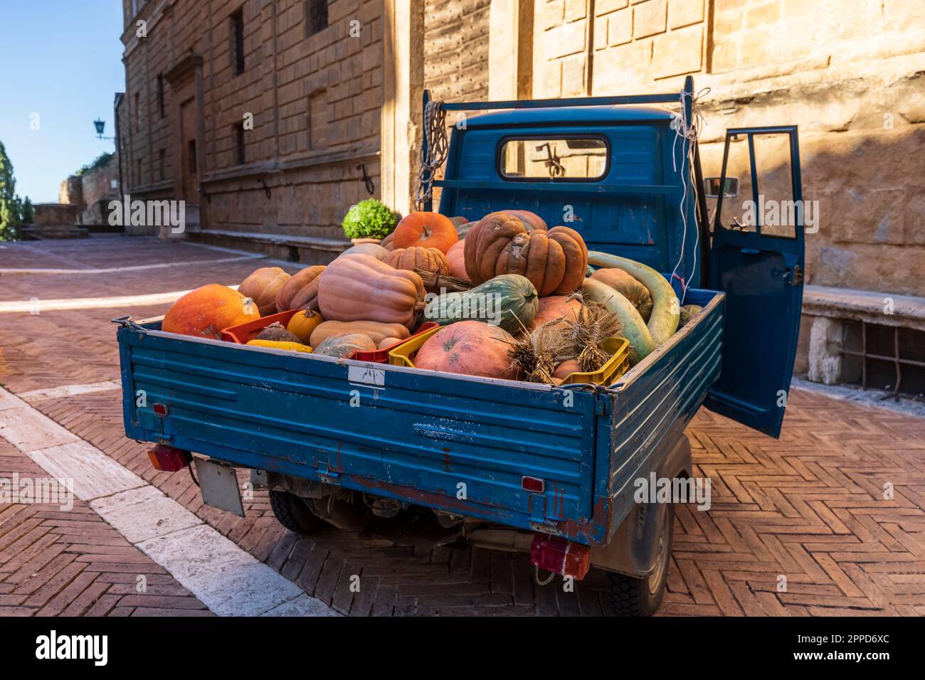 Van transporting heap of pumpkins Stock Photo