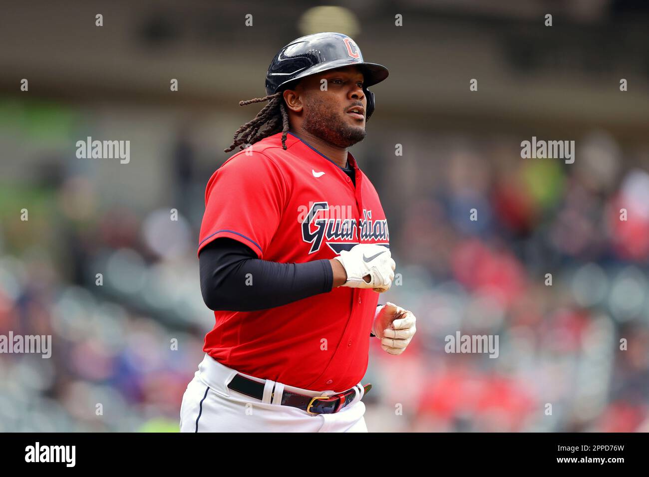 CLEVELAND, OH - APRIL 23: Cleveland Guardians designated hitter Josh Bell  (55) takes first base as he walks during the second inning of the the Major  League Baseball Interleague game between the