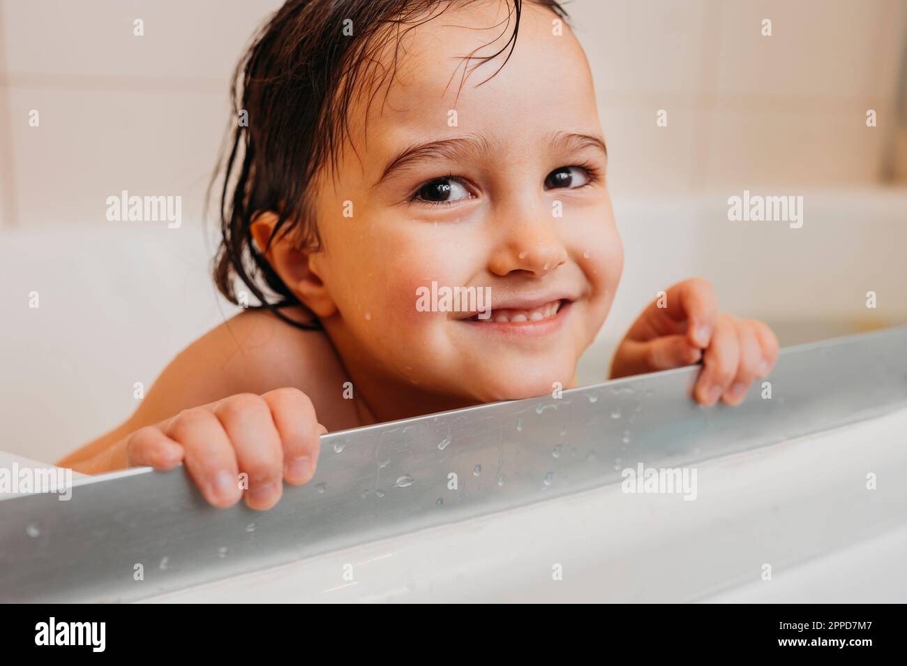 Cute boy bathing in bathtub Stock Photo Alamy