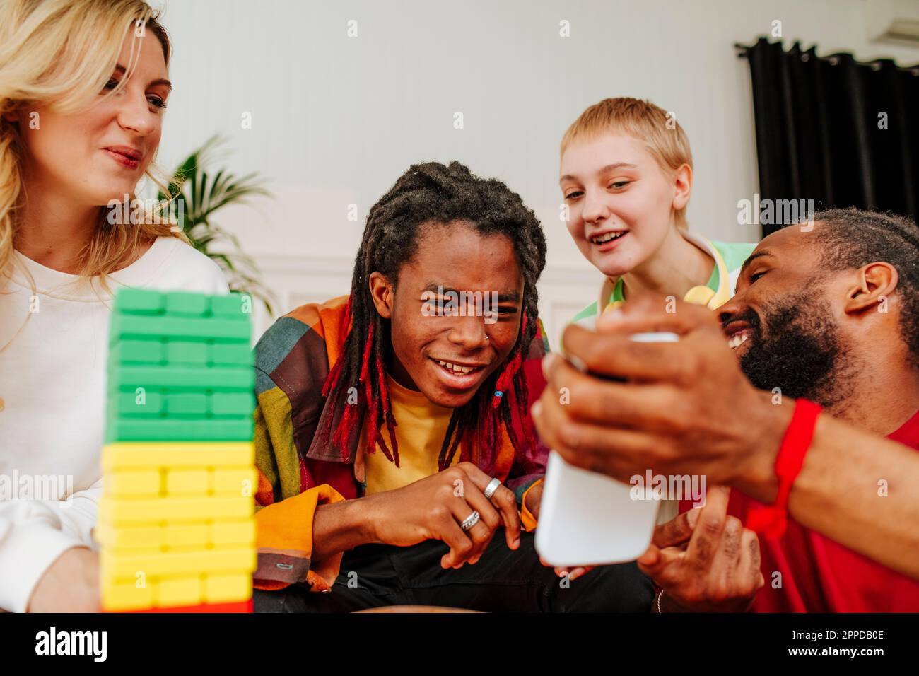Diverse male friends home showing hi-res stock photography and images ...