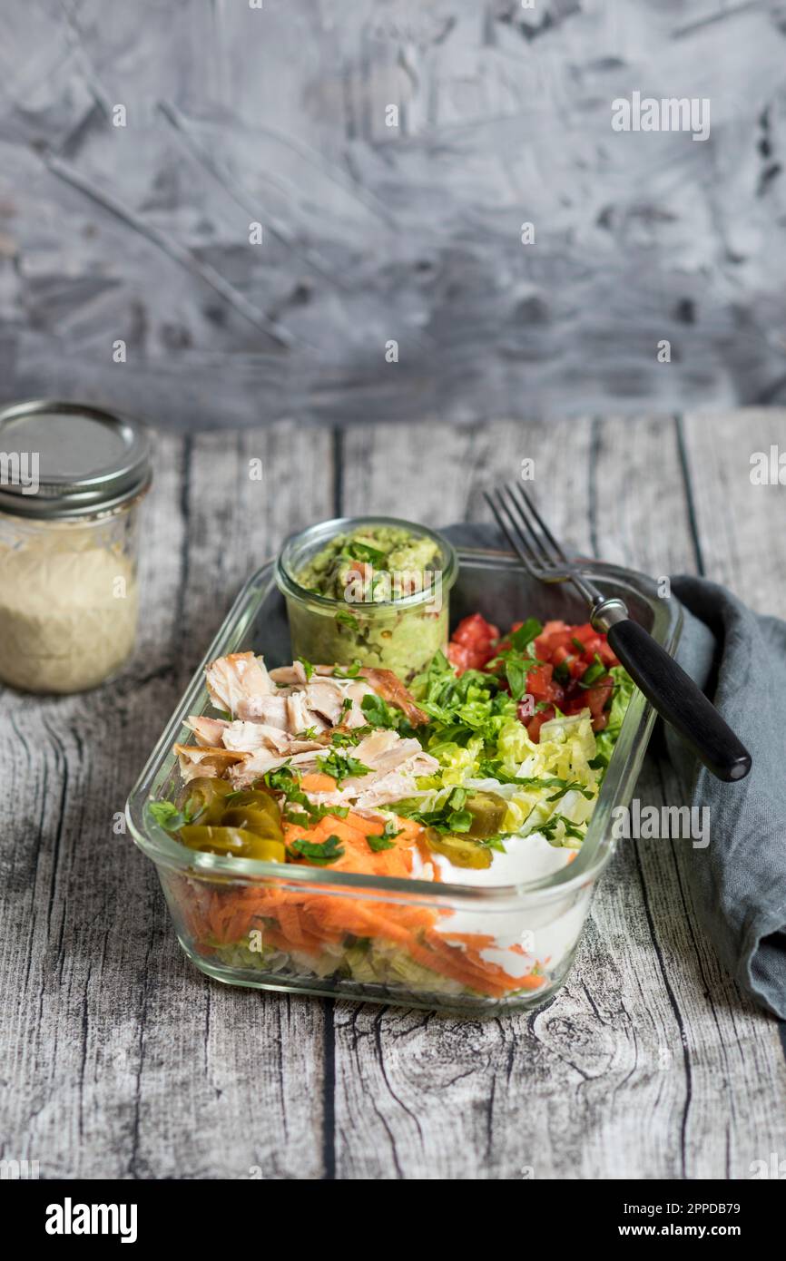 Bowl of vegetable salad with chicken meat Stock Photo