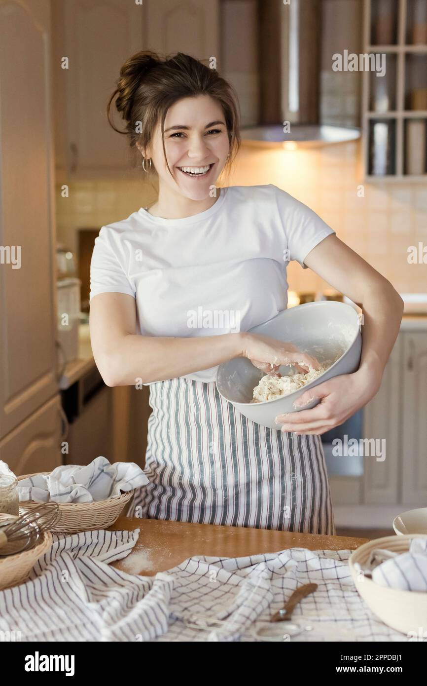 Bread making dough in a bowl Stock Photo - Alamy