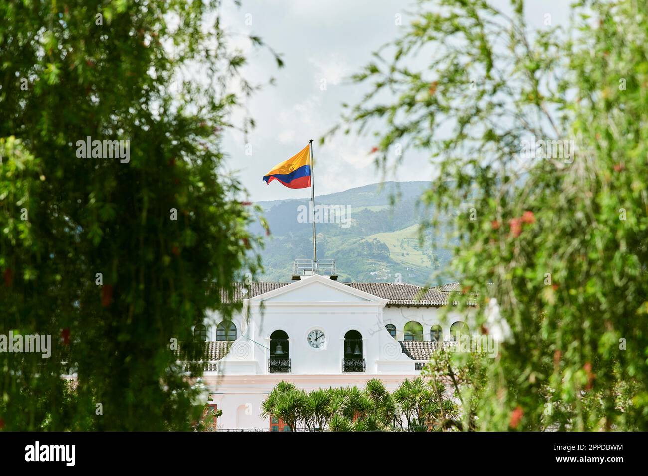 National flag waving on government Palacio de Carondelet Stock Photo